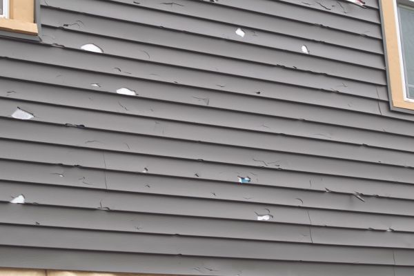 Damaged Siding Replacement in Ooltewah